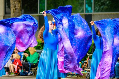Portland, Oregon, USA - June 11, 2022: Century High School Marching Band in the Grand Floral Parade, during Portland Rose Festival 2022.