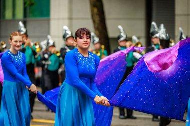 Portland, Oregon, USA - June 11, 2022: Century High School Marching Band in the Grand Floral Parade, during Portland Rose Festival 2022.