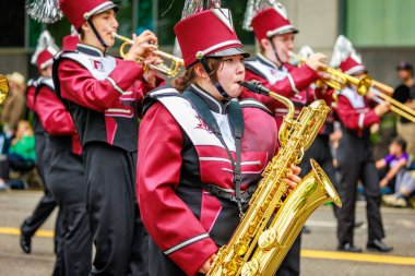 Portland, Oregon, USA - June 11, 2022: Franklin High School Marching Band in the Grand Floral Parade, during Portland Rose Festival 2022.