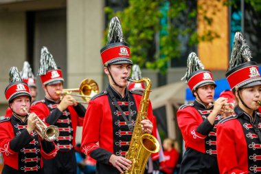 Portland, Oregon, USA - June 11, 2022: Oregon City High School Marching Band in the Grand Floral Parade, during Portland Rose Festival 2022.
