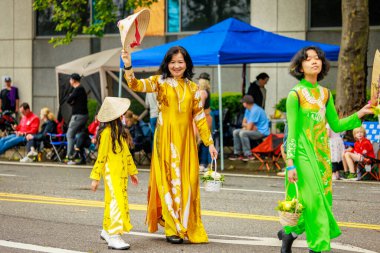 Portland, Oregon, USA - June 11, 2022: Vietnamese Community of Oregon in the Grand Floral Parade, during Portland Rose Festival 2022.