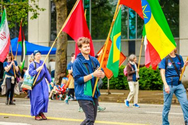 Portland, Oregon, USA - June 11, 2022: Portland Peace Corps Association in the Grand Floral Parade, during Portland Rose Festival 2022.