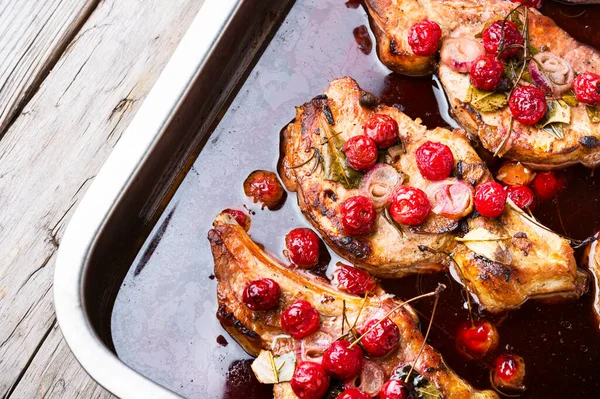 stock image Delicious meat chops stewed in cherry sauce.