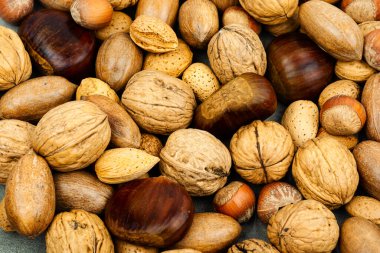 Ceviz, kestane, badem, masada fındık. Sağlıklı yiyecek ve atıştırmalıklar.