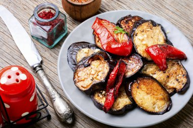 Grilled eggplant and grilled bell pepper on a plate
