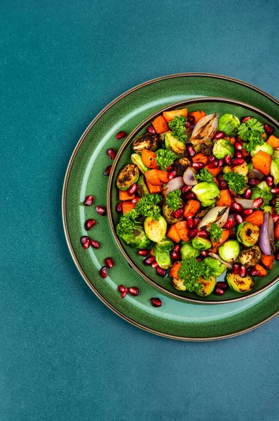 Salad Brussels Sprouts Carrots Decorated Greens Pomegranate Green Plate — Stok fotoğraf