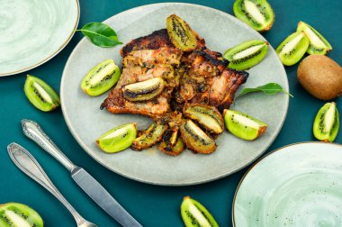 Tasty grilled pork ribs served on plate