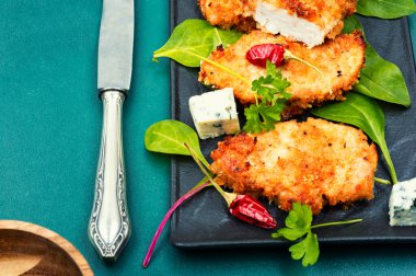 Appetizing chicken breast roasted in breadcrumbs. Chicken schnitzel in breadcrumbs