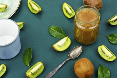 Jam or marmalade made from kiwi in a glass jar. Preserve