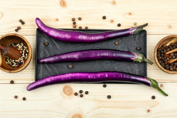 Raw Small Eggplants Wooden Table — Stockfoto