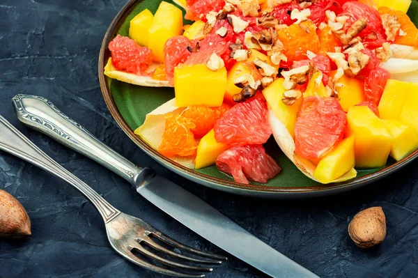 stock image Chicory salad with fruits and walnut. Healthy meal recipe