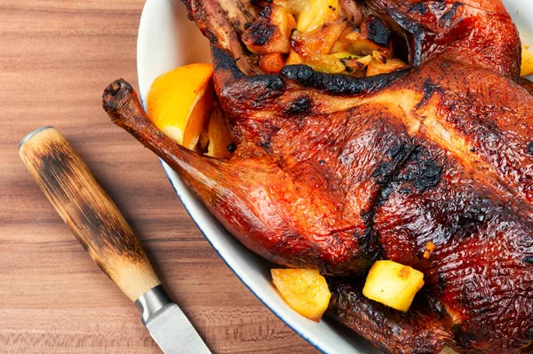 stock image Tasty duck baked with oranges and caramelized apples. Christmas roast goose