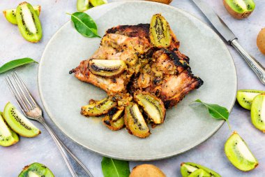 Tasty grilled pork ribs served on plate