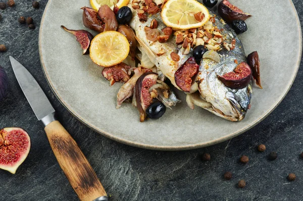 Fried Dorado Fish Garnish Figs Black Stone Background — Stock Photo, Image