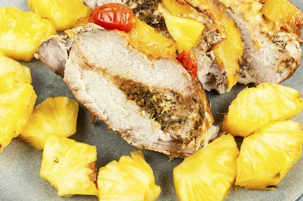 Appetizing meat roasted with fresh pineapple. Cuban food