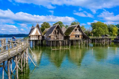 Lake Dwellings Unteruhldingen - The Lake Dwellings of the Stone and Bronze Age (4.000 to 850 BC) are reawakening at Lake Constance (Bodensee) Germany - travel destination clipart