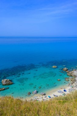 Spiaggia Michelino at Parghelia - Paradise white beach in Calabria at beautiful coast - close to  Tropea - travel destination in Italy clipart