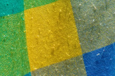 detail of colored wool fabric worn by use with some specks on it, fabric texture clipart