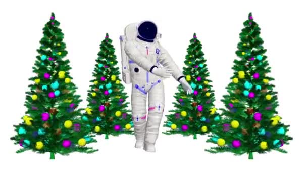 宇宙飛行士はクリスマスツリーで踊ります 宇宙でのクリスマスダンス 3Dアニメーションダンス宇宙飛行士 — ストック動画