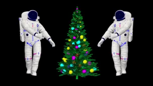 2人の宇宙飛行士がクリスマスツリーで踊る 宇宙でのクリスマスダンス 3Dアニメーションダンス宇宙飛行士 — ストック動画