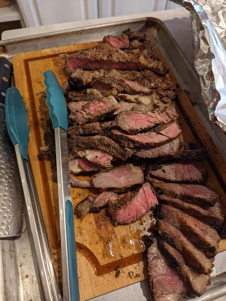 grilled steak medium rare for family dinner