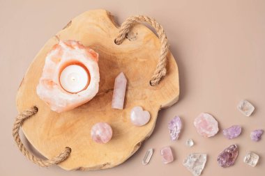 Himalayan rock salt candle holder and gemstones. Balance and calm energy flow at  home, purifying the air,  decrease stress level concept clipart