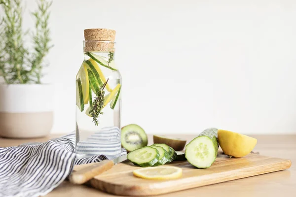Infused Water Cucumber Lemon Thyme Glass Bottle Wooden Table Diet — Stock Photo, Image