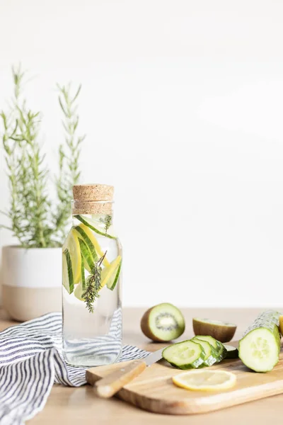 Infused Water Cucumber Lemon Thyme Glass Bottle Wooden Table Diet — Stock Photo, Image
