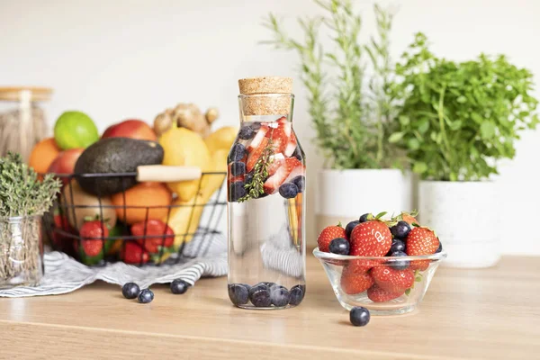 Infused Water Strawberry Blueberries Glass Bottle Wooden Table Diet Detox — Stock Photo, Image