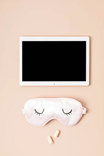Digital tablet mockup and sleeping mask. Application for better sleeping routine, online sleep tracker idea