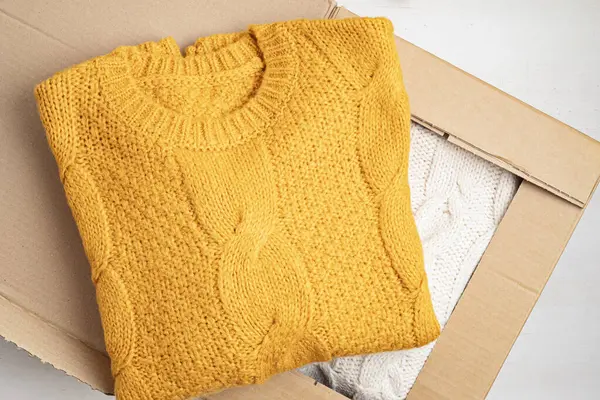 Unpaking Delivery Box Warm Orange Sweater Online Shopping Gifts Fall — Stock Photo, Image