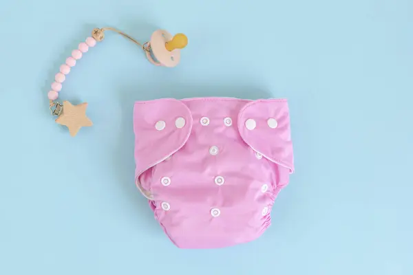 Flat Lay Reusable Pink Cloth Baby Diaper Pacifier Eco Friendly — Stock Photo, Image
