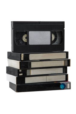 Pile of VHS video cassettes. Vintage media. Isolate on a white background.