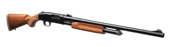 ポンプアクション12ゲージ散弾銃は白い背景に隔離されています 木のストックを持つ滑らかなボアの武器 ロイヤリティフリーのストック画像