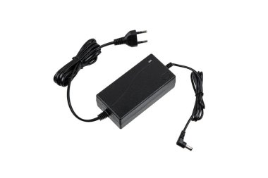 Çeşitli elektronik aletler için güç kaynağı. AC 220 voltu DC 'ye dönüştürmek için bir cihaz. Beyaz arkaplanda izole et.