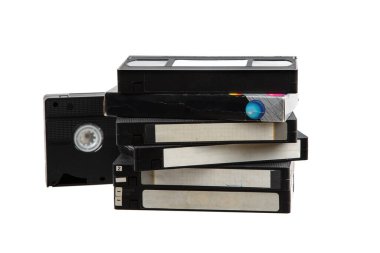 Pile of VHS video cassettes. Vintage media. Isolate on a white background.