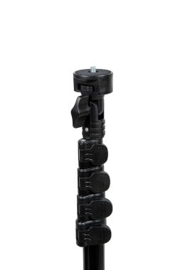 Beyaz arkaplanda izole edilmiş küçük kamera için siyah mini tripod.