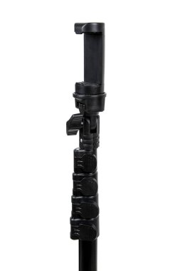 Beyaz arkaplanda izole edilmiş küçük kamera için siyah mini tripod.