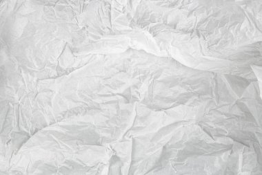 Buruşuk beyaz kağıt dokusu, soyut arkaplan, yüksek çözünürlük, tasarım projeleri, ambalaj ve yaratıcı çalışmalar için uygun.