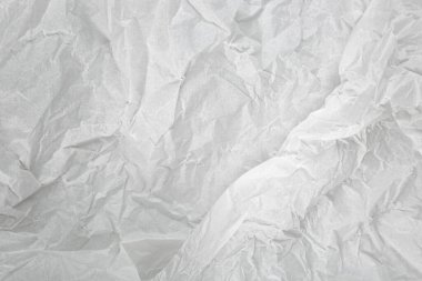Buruşuk beyaz kağıt dokusu, soyut arkaplan, yüksek çözünürlük, tasarım projeleri, ambalaj ve yaratıcı çalışmalar için uygun.