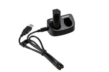 A black USB battery charger with a connected cable and a single battery inserted, isolated on a white background, ideal for portable charging and power management. clipart