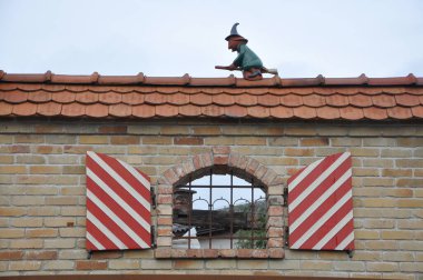 German-style villa in Obernberg am Inn, Germany December 2022. Decorated window and decorative elements around