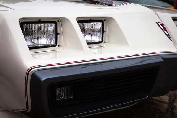 stock image The iconic Pontiac Firebird, with its sleek design and powerful engine, steals the spotlight at the American car show, captivating enthusiasts and onlookers alike