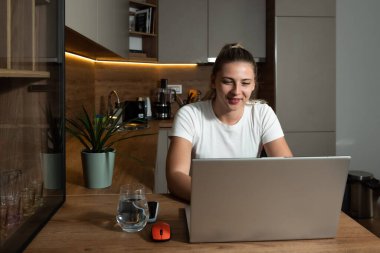 Young volunteer has an online video call with people who need to talk due to depression. Woman lost her job volunteered at the center for adults and the sick. She thanked her for the nice experience