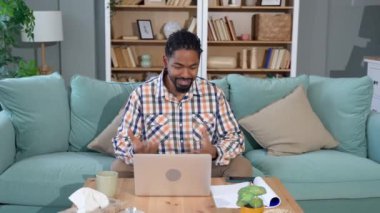 Young black African American man talking on video call with his psychotherapist doctor after online therapy sessions, happy that he is well and mentally health now after telemedicine conversations.