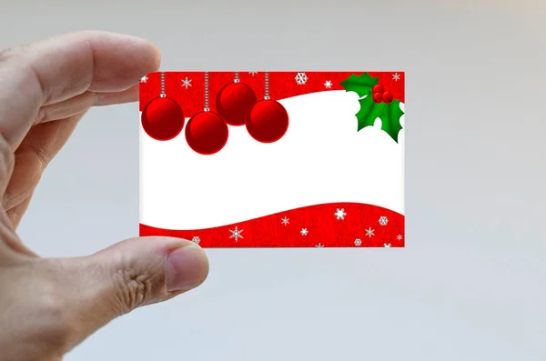 Ręcznie Trzymając Kartkę Świąteczną — Zdjęcie stockowe