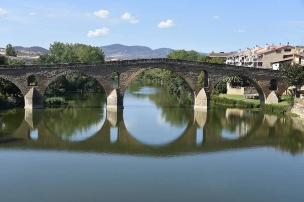 stock image Puente la Reina, Spain - 31 Aug, 2022: Arches of the roman Puente la Reina foot bridge, Navarre, Spain