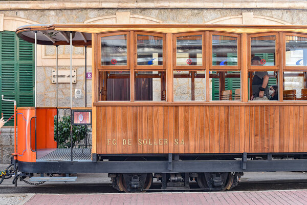 Port de Soller, Mallorca, Spain - 11 Nov 2022: Ferrocarril Tram train in the tourist town of Soller