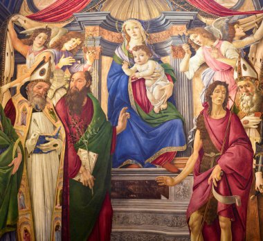 Floransa, İtalya - 20 Kasım 2022: Madonna ve çocuğu Uffizi galerisinde İskenderiyeli Aziz Catherine tablosuyla tahta çıktılar.