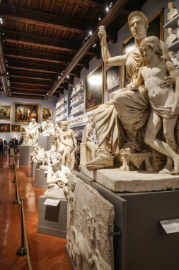 Florence, Italy - 20 Nov, 2022: Religious artwork and marble sculptures in the Academy Gallery clipart